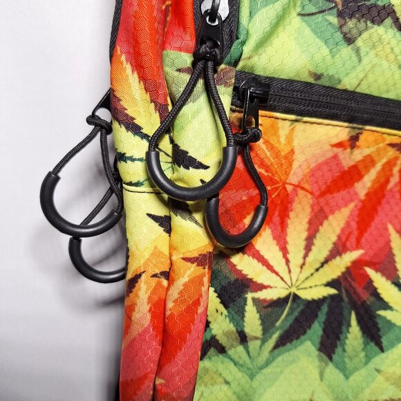 Vibedration Hydration Backpack w/o bladder - green, orange, black leaves… - Picture 4 of 16